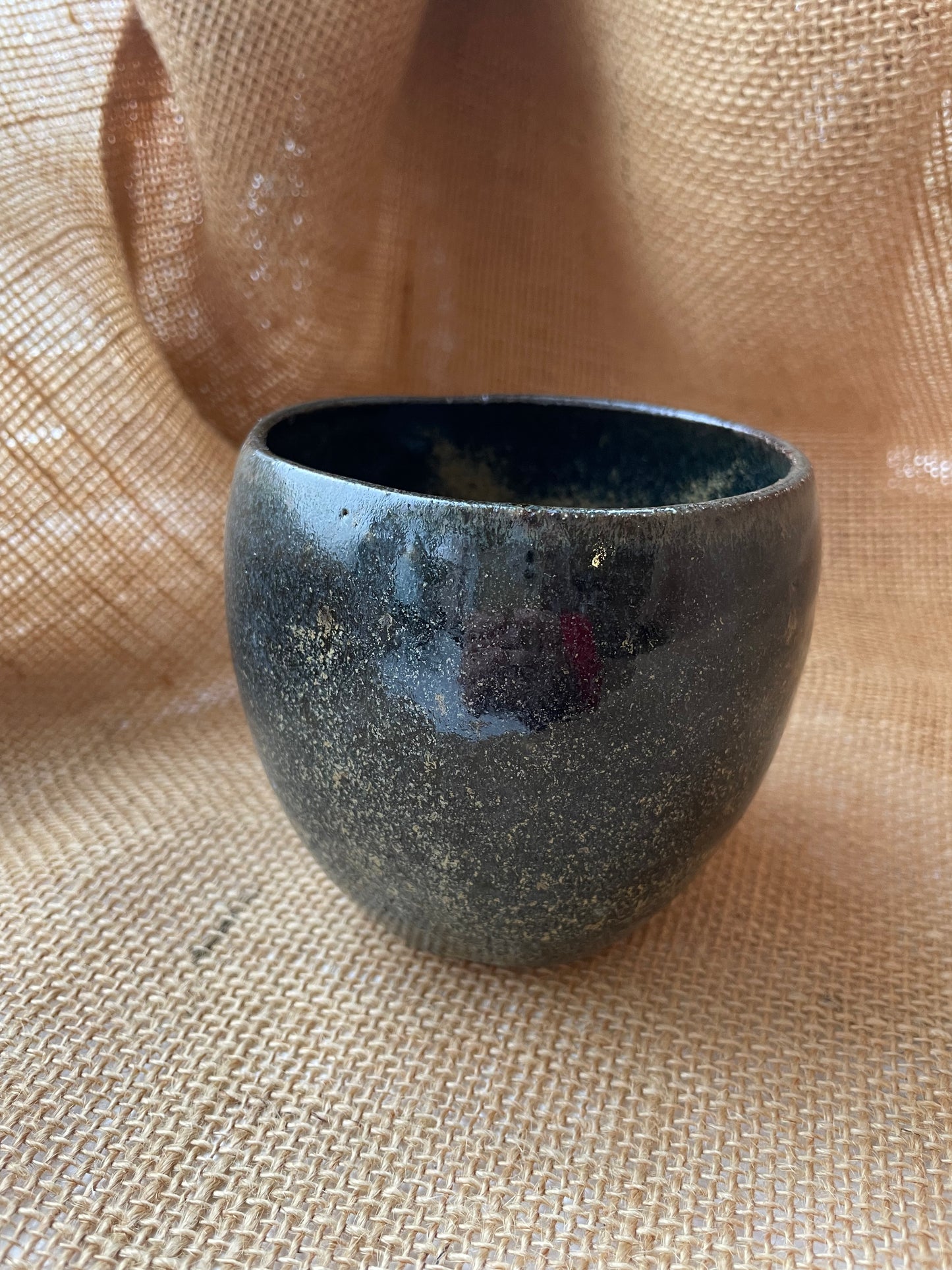 Mug in black with gold specks, pebble shape, handmade ceramics #1