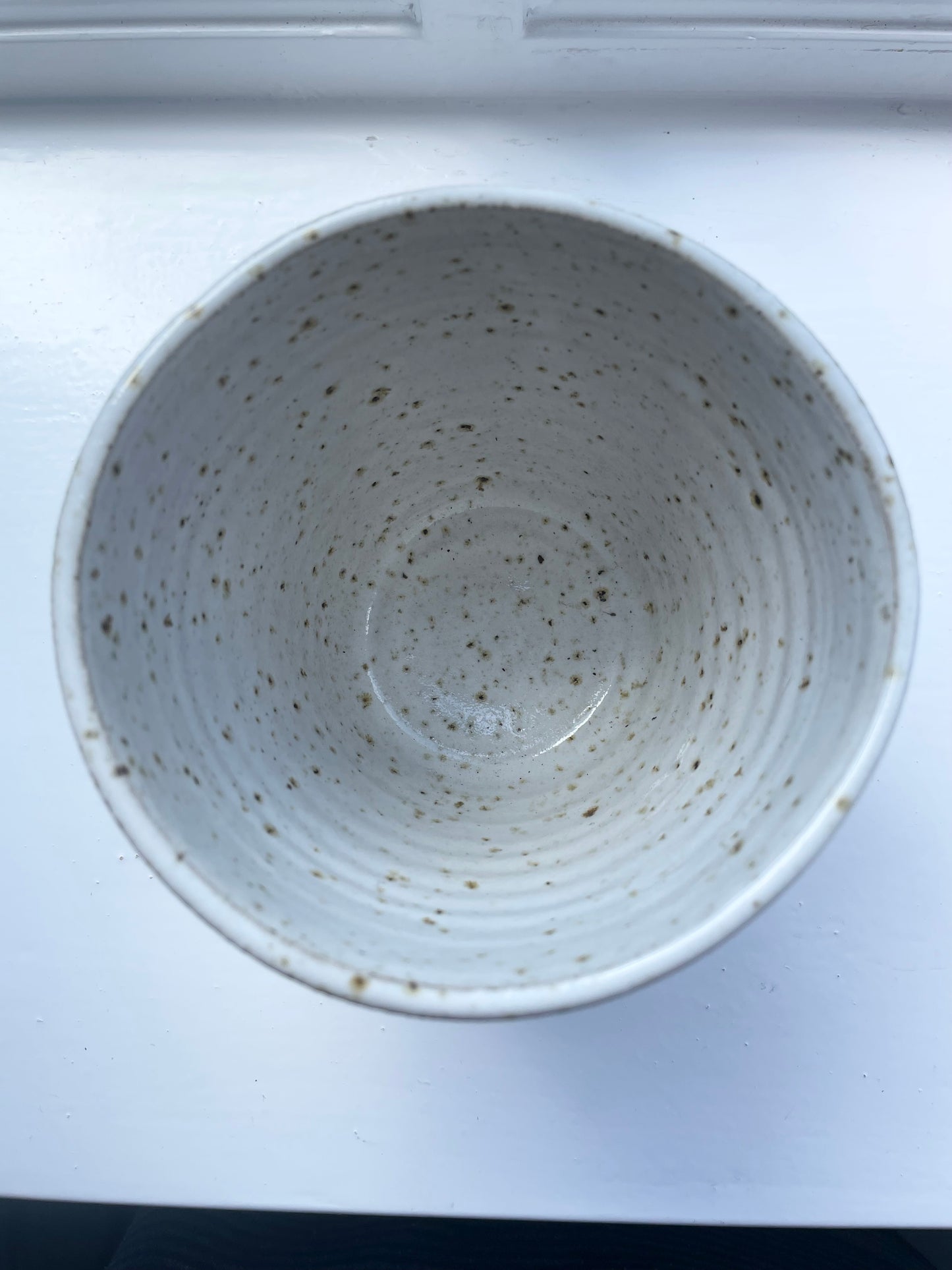 Pot in flecked white with spiral pattern, handmade ceramics