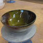 Bowl in dark green, Japanese ruku style, smooth and rough surface