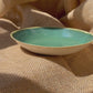 Plate in green, smooth, handmade ceramics