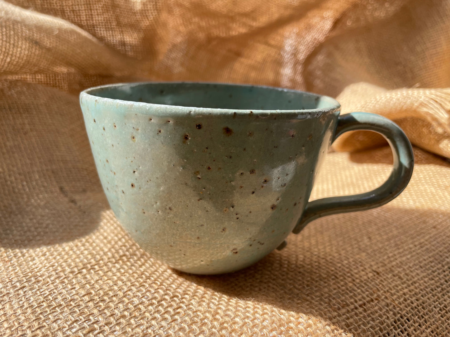 Question Mug in green, slightly grogged, handmade ceramics