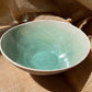 Bowl in semi transparent light green, handmade ceramics