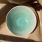 Bowl in semi transparent light green, handmade ceramics