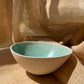 Bowl in semi transparent light green, handmade ceramics