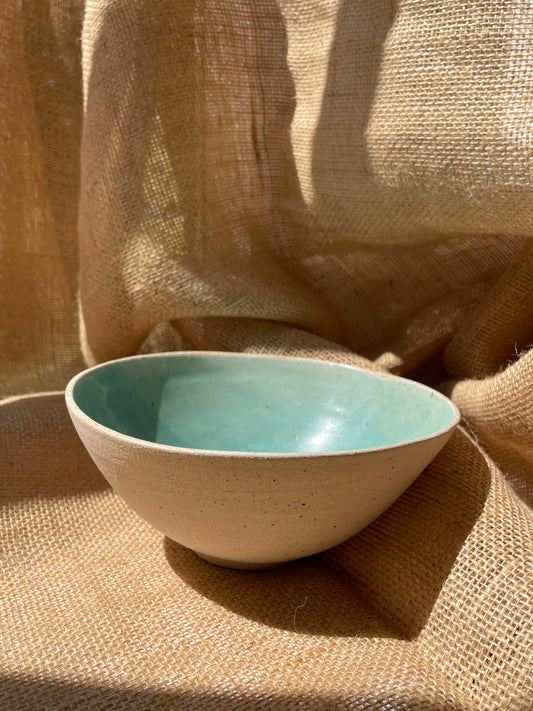 Bowl in semi transparent light green, handmade ceramics