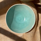 Bowl in semi transparent light green, handmade ceramics