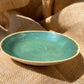 Plate in green, smooth, handmade ceramics