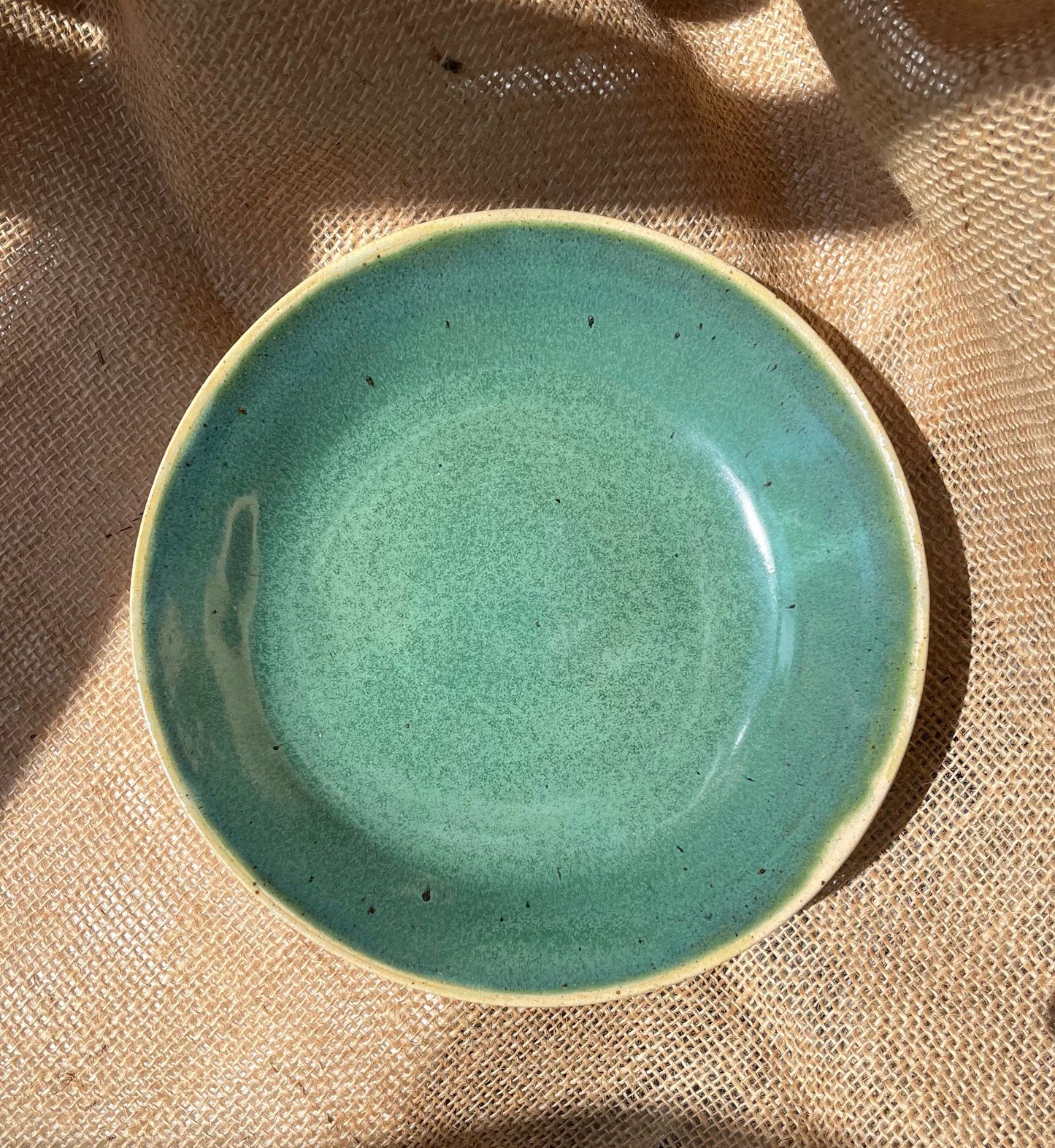 Plate in green, smooth, handmade ceramics